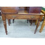 A 20thC stained oak single drawer side table,