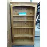 A modern waxed pine open front, five tier bookcase,