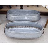 Two modern galvanised iron garden planters with ring handles 19'' & 26''L CA