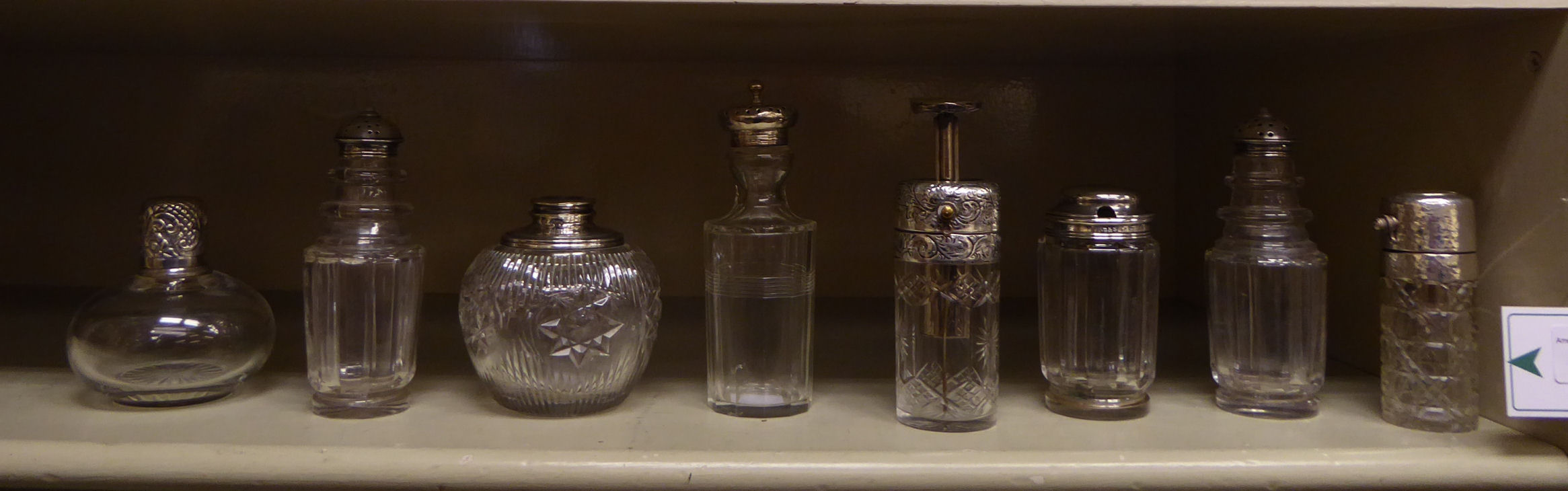 Eight 19thC and later silver capped dressing table scent bottles mixed marks OS1