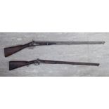 Two similar mid 19thC percussion action shot guns with wooden stocks LAF