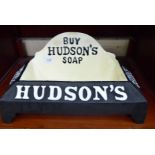 A cast iron dog's bowl with advertising logos for 'Hudson's Soap' 15''w CA