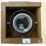 A gimbal mounted ship's compass, in a mahogany case 8.