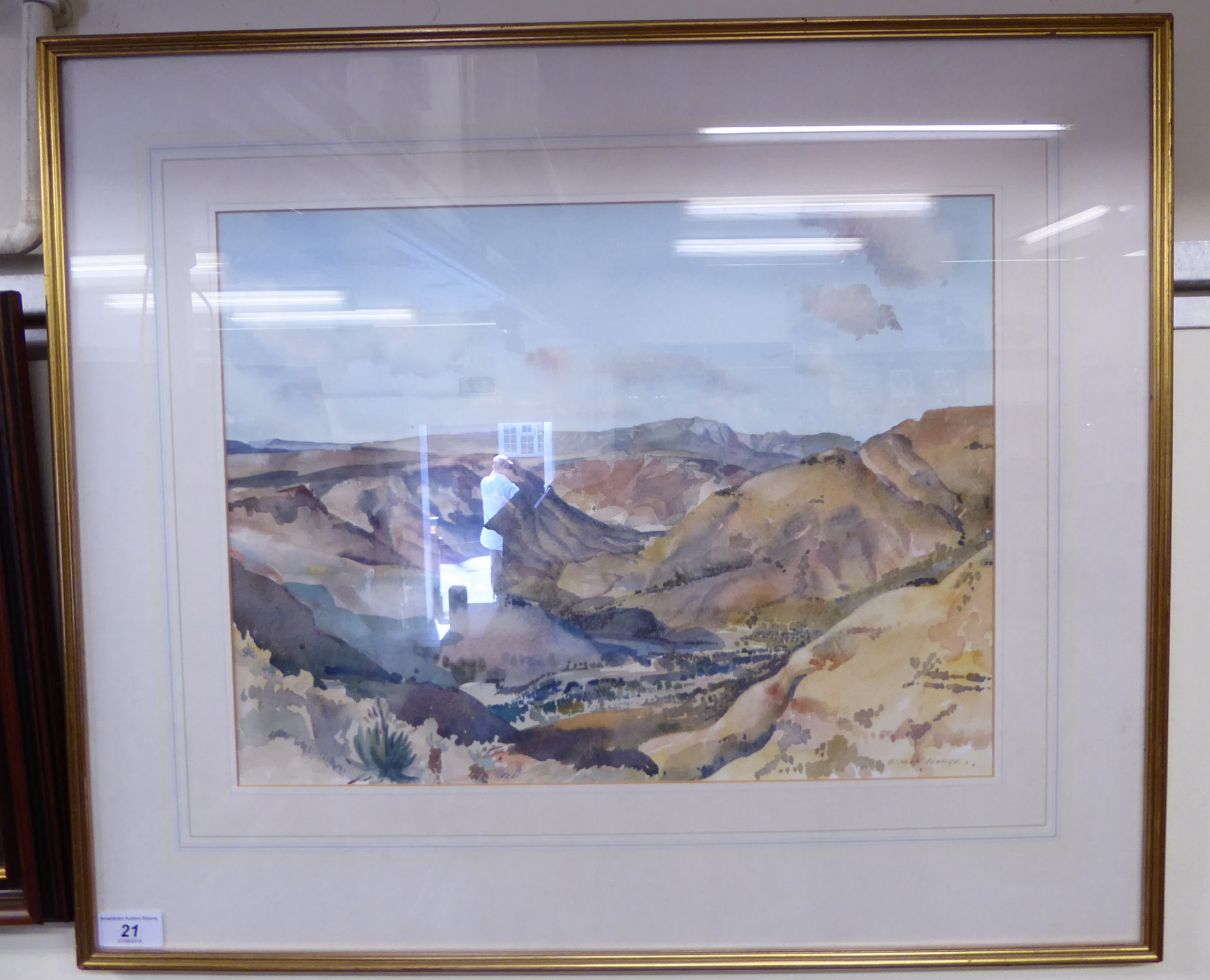 Simon Hodges - a landscape with a valley and mountains beyond watercolour bears a signature 16''