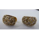 A pair of 18ct gold and diamond set earrings 11