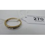 A 9ct gold half-eternity ring,