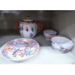 Two late 19thC Chinese porcelain tea bowls and a saucer,