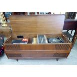 A 'vintage' teak cased Garrard radiogram, comprising a record deck and tuner,
