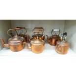 Six Victorian copper kettles OS5