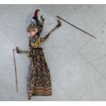 A 20thC Indonesian painted wooden puppet,