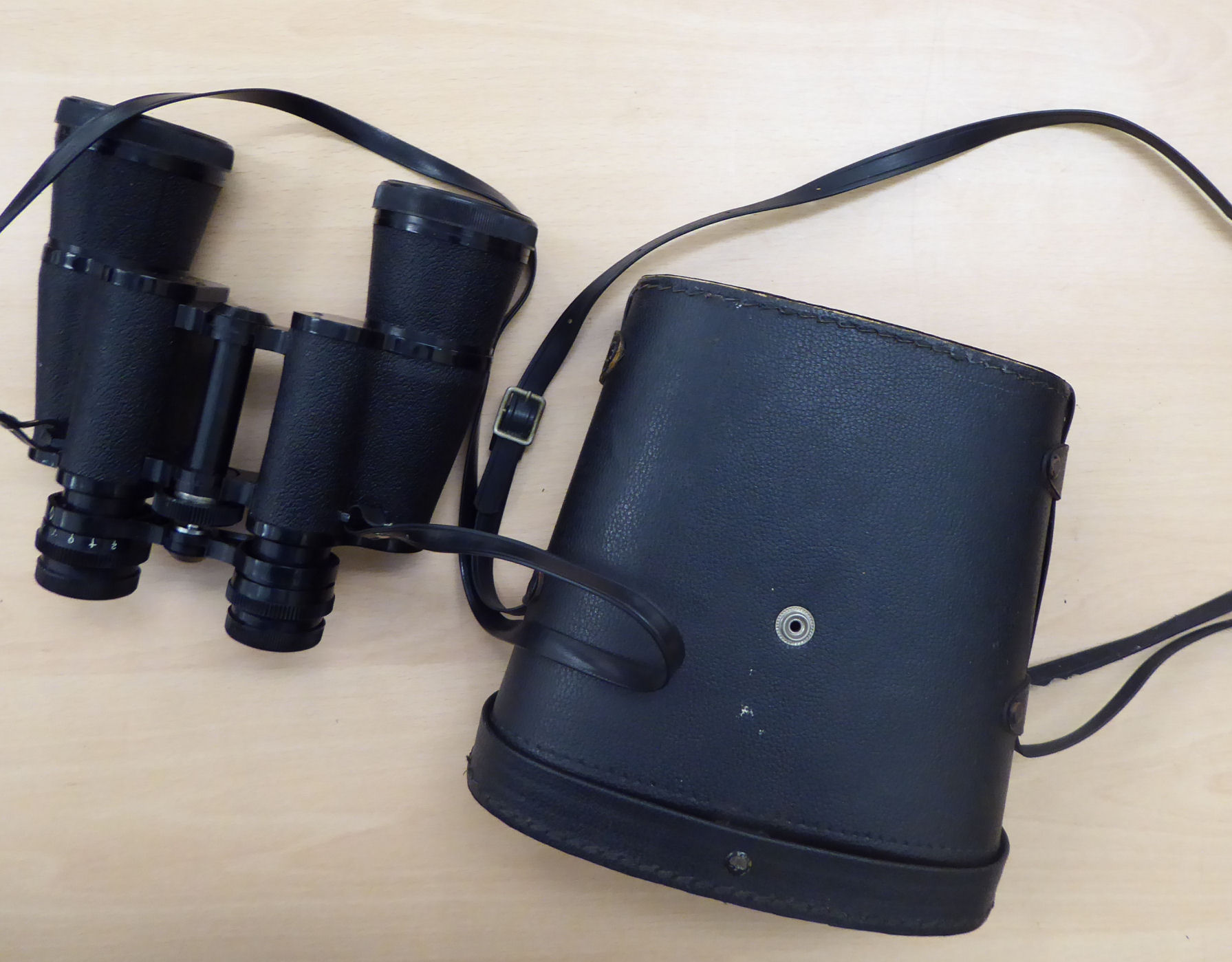 A pair of Prinz 10x50 field binoculars cased OS5