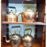 Four Victorian and later copper kettles with fixed top handles LAM