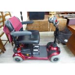 An Invacare Lynx battery powered four wheeled mobility scooter CA