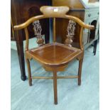 A modern Chinese exotic hardwood framed, twin splat back corner chair,