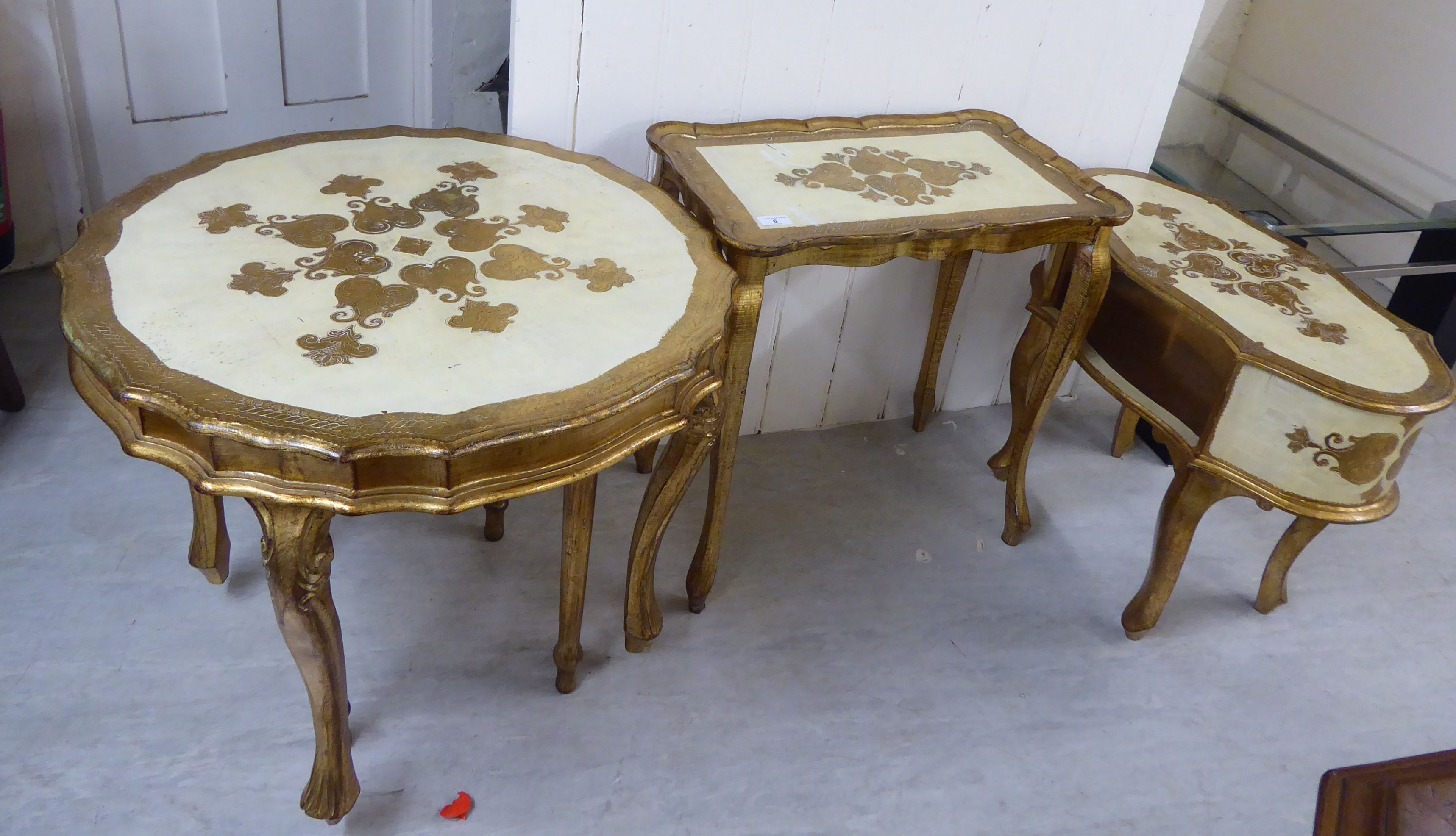 Small furniture: to include three pieces of 20thC Italian inspired cream and gilt painted