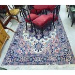 A Tabriz rug with a central medallion on a pink and blue ground 116'' x 74'' LAM