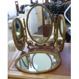 A mid 20thC gilded gesso triptych dressing table mirror 22''h 28''w RAB