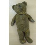 An early 20thC mohair Teddy bear with button eyes and mobile limbs 22''h CA