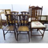 Chairs: to include a set of four Ercol beech and oak dining chairs,