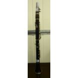A rosewood and silver plated five piece clarinet CA