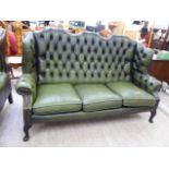 A mid 20thC Georgian style wingback,