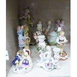 Decorative ceramics: to include mid 20thC European porcelain figures wearing period costume