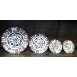 A graduated set of four Royal Crown Derby bone china plates,