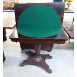 A William IV rosewood card table, the rotating, foldover top raised on a tapered column,