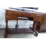 A late Victorian mahogany five drawer desk,