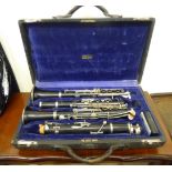 Two Louis & Co Ltd ebony cased and silver plated clarinets,