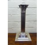 A silver plated on copper table lamp, fashioned as a Corinthian capital,