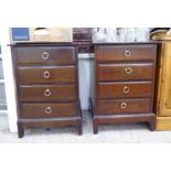 A pair of Stag mahogany four drawer dressing chest,