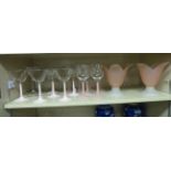 Clear and pink coloured pedestal drinking glasses: to include wines and cocktail glasses OS10
