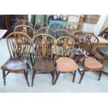 A matched set of twelve 19thC Windsor beech and elm framed hoop, spindle, splat back chairs,