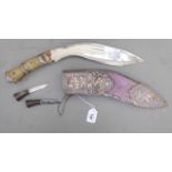 An early 20thC kukri with a two part horn handle,