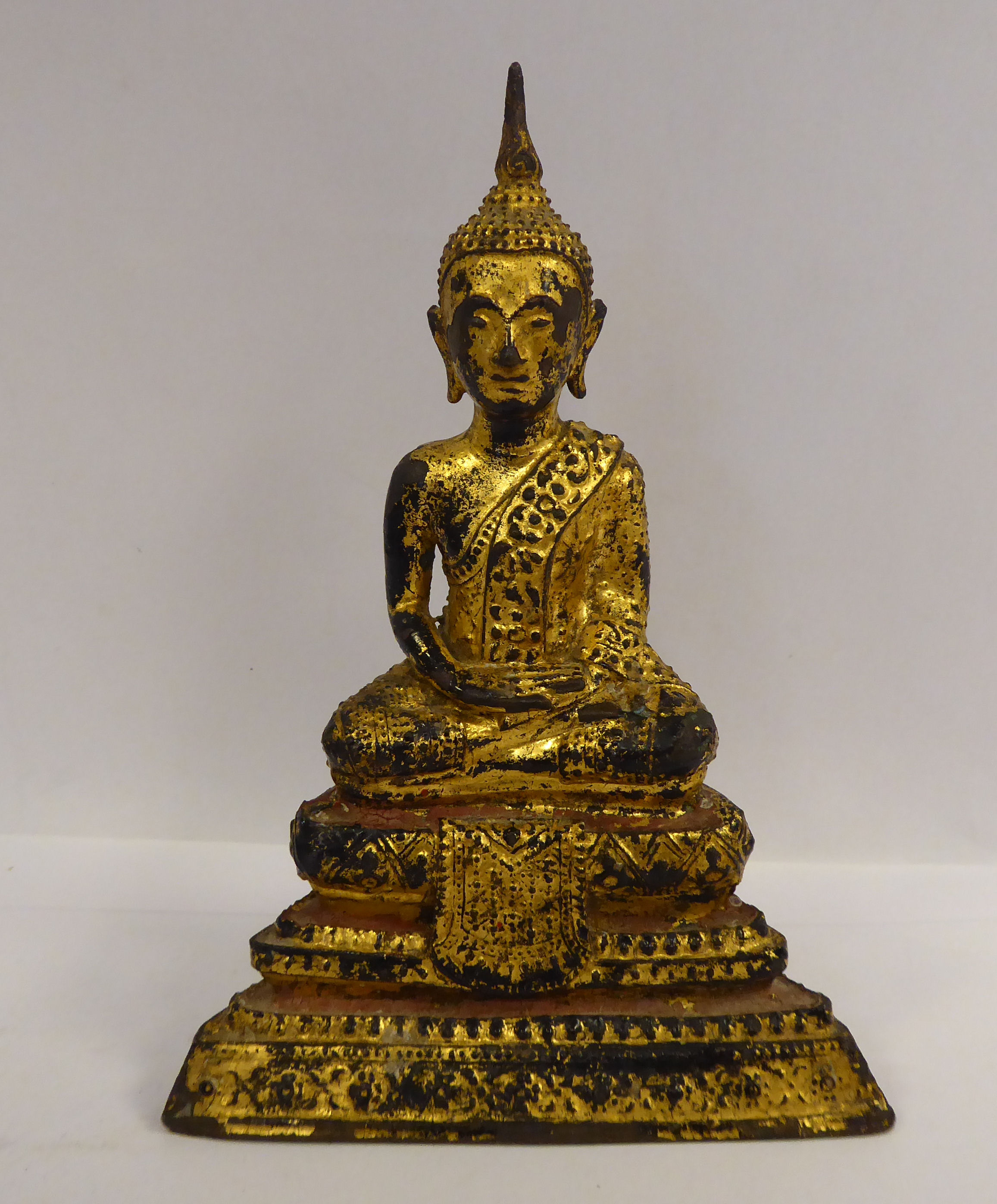 An 'antique' Asian cast gilt bronze figure,