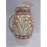 A Charlotte Rhead, Bursley Ware china jug of ovoid form with a drawn loop handle and pouring lip,