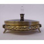 A late 19thC Faberge silver gilt powder box of circular form,