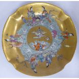 A Chinese Jiaqing period porcelain bowl, decorated with figures amongst crashing waves,