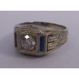 A gentleman's bright-cut engraved white gold signet ring, rubover set with a diamond,