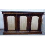 A Regency rosewood side cabinet with an inset mottled grey coloured marble top, over three in-line,