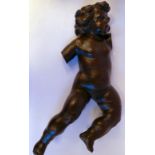 A mid 19thC carved and stained polychrome softwood putti 29''h