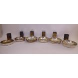 A series of six silver dishes with attached matchbox holders Goldsmiths & Silversmiths Co London