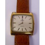 A 1970s Omega gold plated stainless steel cased wristwatch, faced by a silvered baton dial,