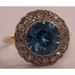 An 18ct gold blue zircon and diamond set cluster ring