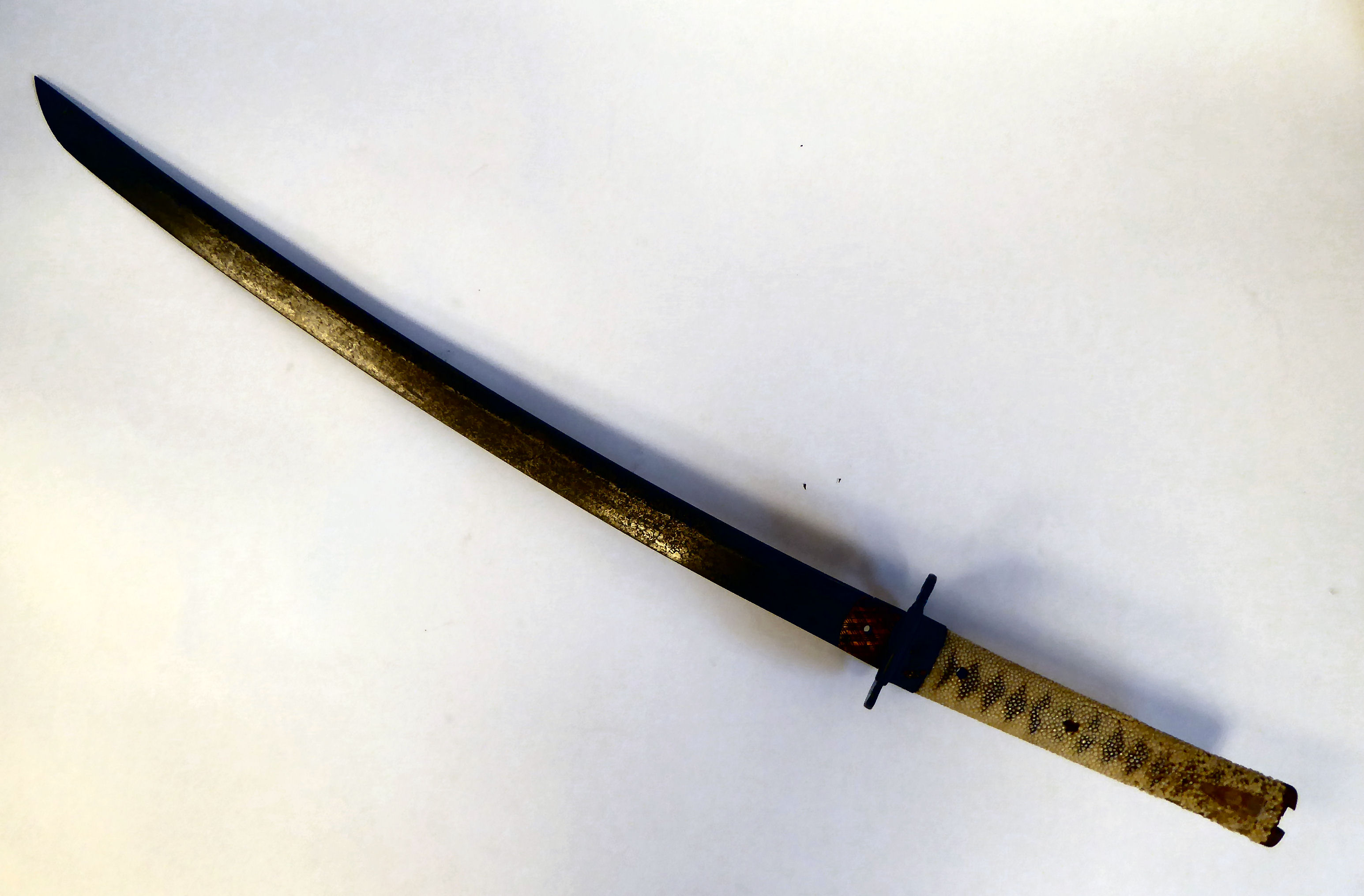 A mid 19thC Samurai sword with a shagreen bound handle and cast bronze tsuba the blade 21''L - Image 2 of 10