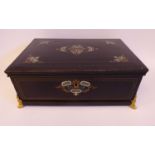 A late Victorian brass tortoiseshell and turquoise inlaid, ebonised box with a hinged lid,