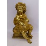 A cast gilt bronze classical figure, a seated child,