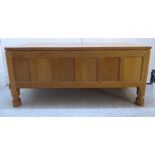 A Robert Thompson MouseMan light oak blanket chest with straight sides,