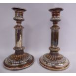 A pair of Matthew Bolton mid 19thC silver plated telescopic candlesticks with reed moulded and